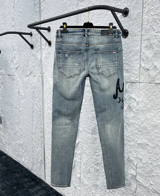 Amiri MX1 Distressed Denim Jeans