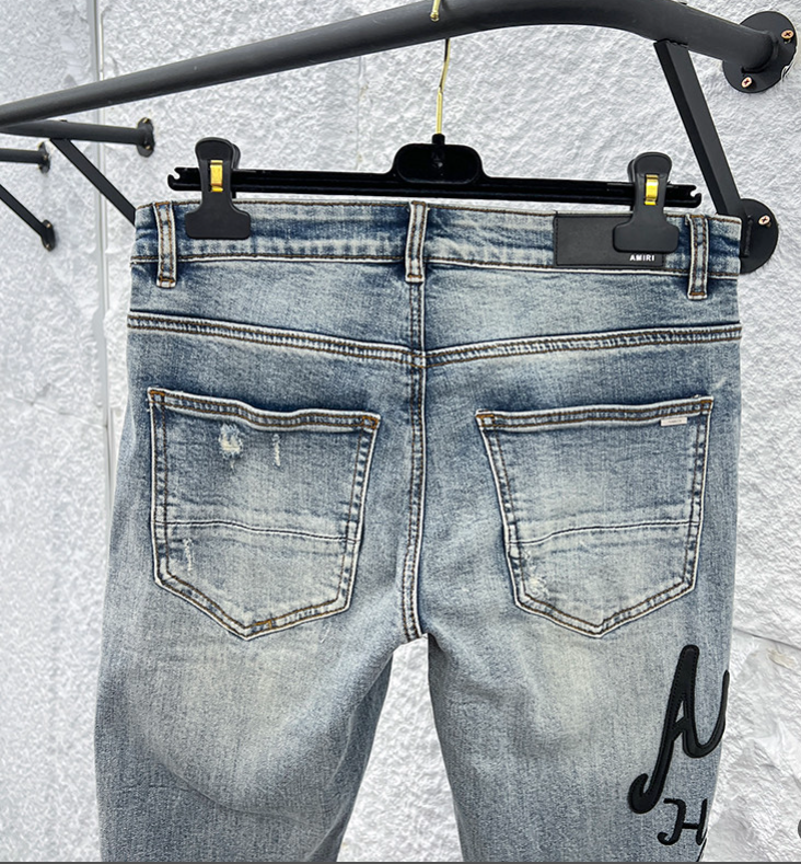 Amiri MX1 Distressed Denim Jeans
