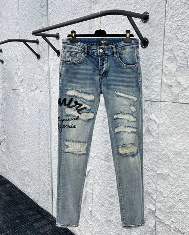 Amiri MX1 Distressed Denim Jeans