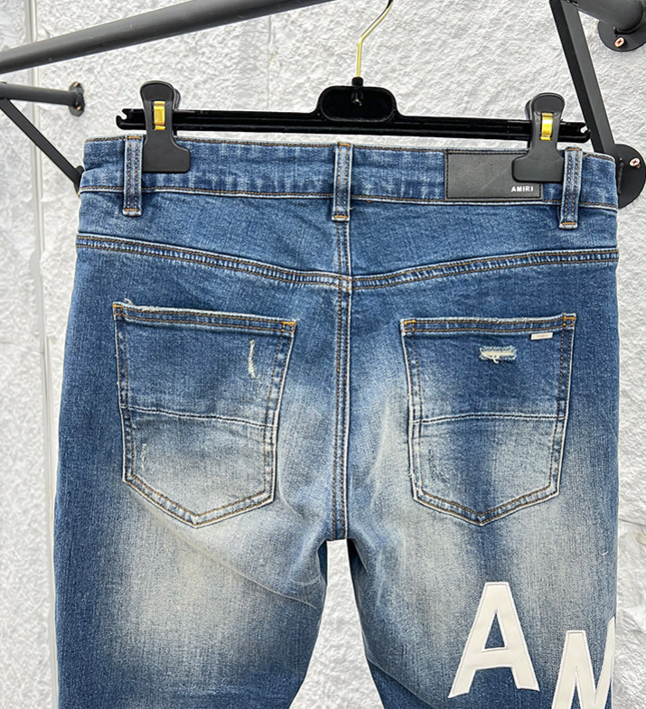Amiri MX1 Distressed Denim Jeans