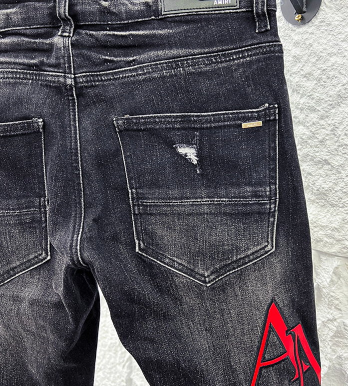 Amiri MX1 Distressed Denim Jeans