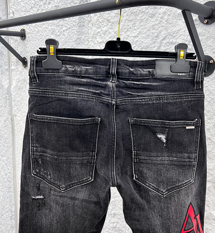 Amiri MX1 Distressed Denim Jeans